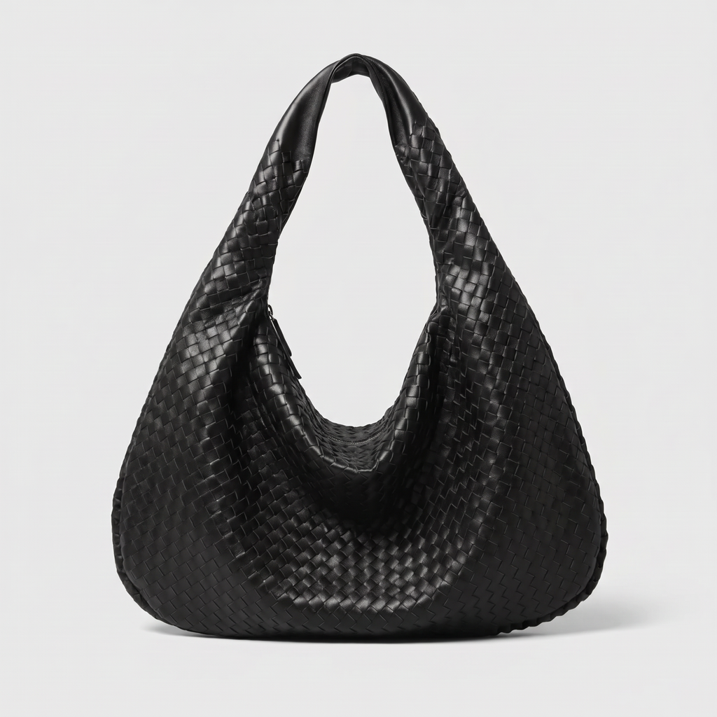 Eden Bag in black woven leather, front view