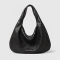 Eden Bag in black woven leather, front view